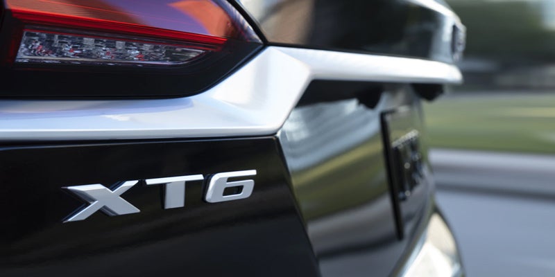 Close-up of the Cadillac XT6, highlighting the 'XT6' badge