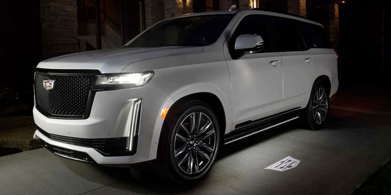 Cadillac Escalade parked, showcasing its bold design and presence